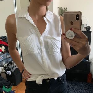 Sleeveless white button up shirt